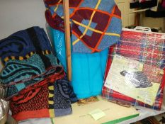 A quantity of picnic and other blankets.