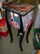 A two drawer side table decorated with images of Marilyn Monroe, COLLECT ONLY.