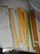 A mixed lot of 20th century rulers etc.,