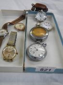 A mixed lot of gent's pocket and wrist watches.