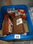 A crate of assorted playing cards etc.,