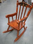 A doll's rocking chair.