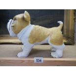 A bulldog figure.