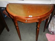 A D shaped mahogany hall table. COLLECT ONLY.