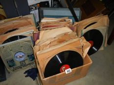 A large quantity of 78rpm records and empty sleeves.