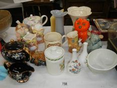 A mixed lot of teapots, bowls etc.,