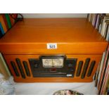 An old 20th century wood cased record player.