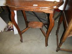 A mahogany occasional table. COLLECT ONLY.