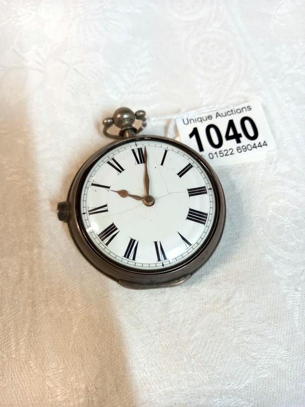 A silver chain driven pocket watch, Thos. Crawshaw Retford, in working order.