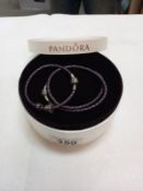 A boxed Pandora necklace/choker and bracelet.
