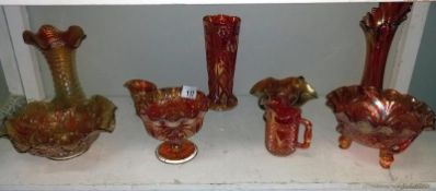 A quantity of orange iridescent carnival glass COLLECT ONLY