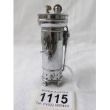 A very unusual chrome plated cigarette lighter in the form of a Stott's tea urn. Looks unused.