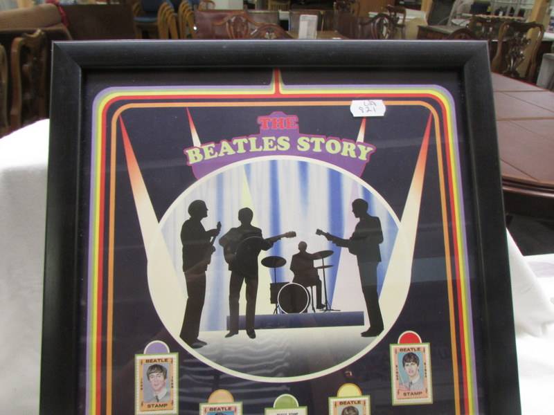 The Beatles Story coin and stamp collage. - Image 2 of 3