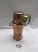 A copper lamp marked CEAG Ltd., Barnsley, Yorks.