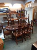 A set of 8 mahogany shield back wheatsheaf dining chairs