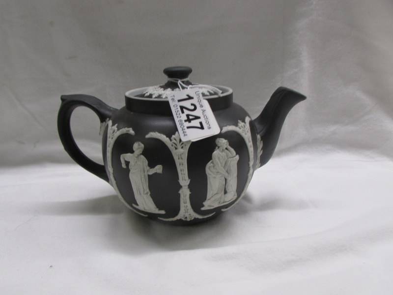 An antique Dodson bros. black Jasper ware teapot with lid, perfect and looks unused.