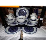 Approximately 36 pieces of Royal Doulton tangier dinner and tea ware.
