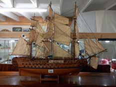 A wooden hand built model of a French galleon, Lesuperbe. Length 87cm, Height 69cm.