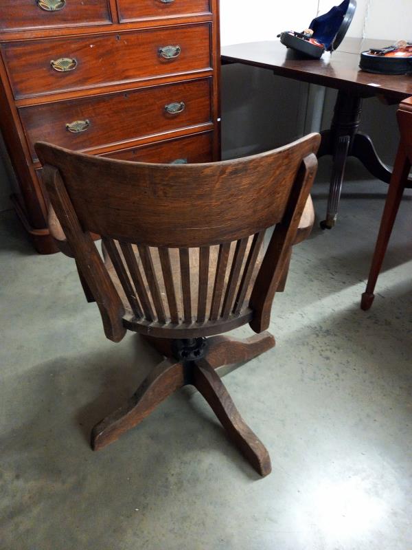 A 1920's oak industrial swivel office chair. Collect only. - Bild 4 aus 4