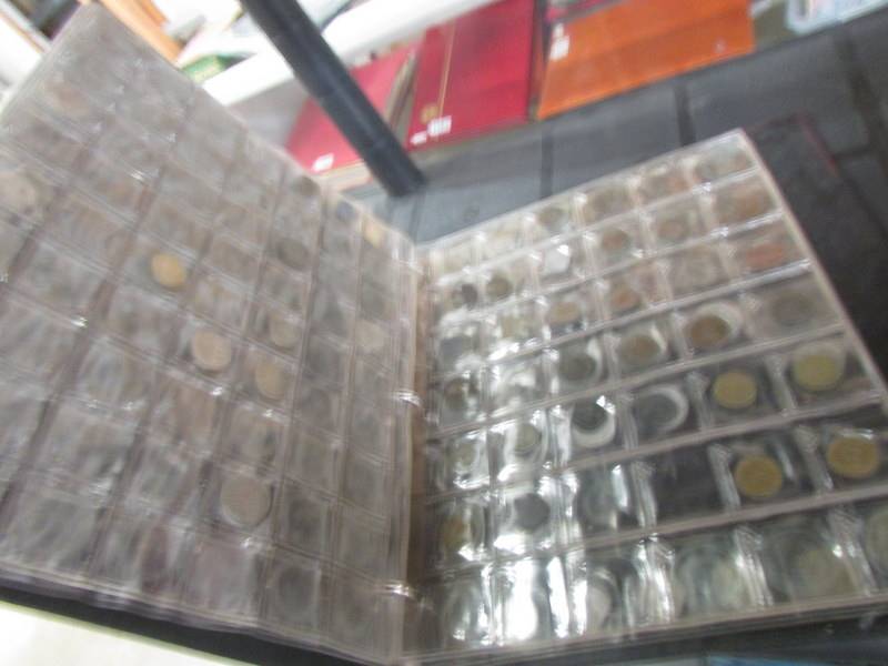A mixed lot of modern crown coins, sixpences and two part filled albums. - Image 4 of 4
