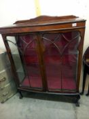 An Edwardian mahogany display cabinet. (Crack in 1 piece of glass) 105 cm x 38cm x height 132cm.