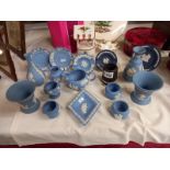 A varied selection of blue Wedgewood Jasperware various dishes etc