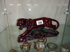 A flambe resin ornament of a tiger