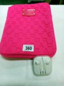 A pink Marc by Marc Jones standard supply iPod case and cased Apple earbuds.