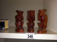 3 carved wooden 3 wise monkeys.