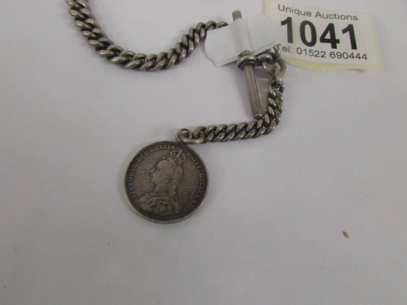 A silver watch chain with Victorian silver coin fob, 49 grams. - Image 2 of 2