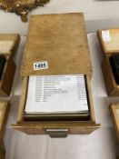 A collection of c. 84 glass and celluloid negatives housed in a wooden box, the majority being