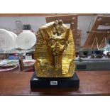 A large gilded Egyptian bust of Tutankhamun burial mask. Height 32cm base. 28.5cm x 18cm x 5cm.