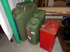 A 10 Litre and 20 Litre metal Jerry cans and a Valor 2 Gallon petrol can.