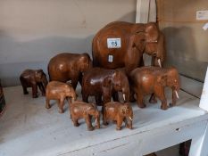 8 wooden elephant ornaments