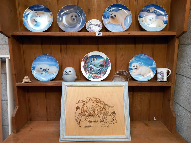 A collection of seal related items including 6 x Franklin mint limited edition porcelain plates,