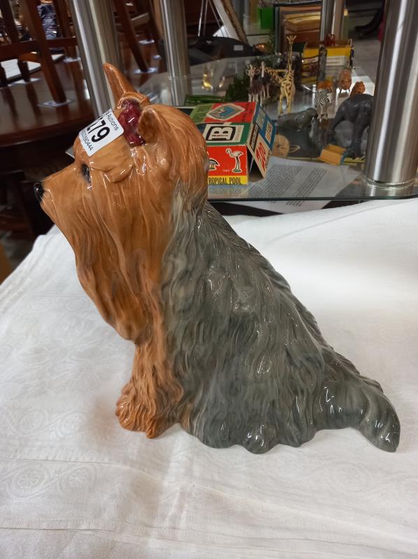 A 10.5" high Beswick Yorkshire terrier, matt finish in brown and grey (small nick out of 1 ear). - Image 2 of 5