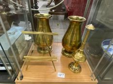 A pair of heavy brass vases, a brass easel etc.
