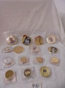 Fifteen Queen Elizabeth II commemorative coins.