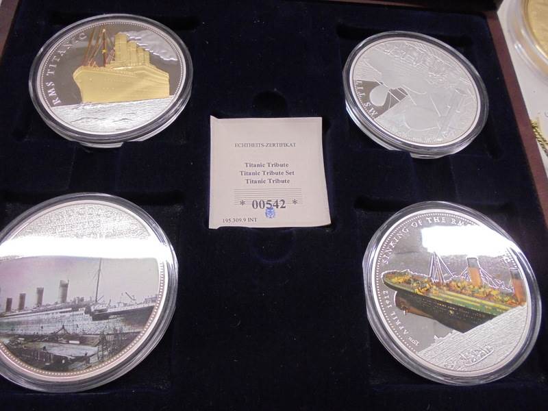 A cased set of 4 Titanic coins, Complete Victory 50p coin set, Icons of Britain 'Westminster Abbey' - Image 2 of 7