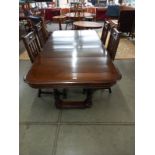 A 19/20th century French oak extending dining table with 3 leaves and a set of 4 chairs. 105cm x