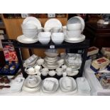 A large selection of white glazed dinner/table ware.