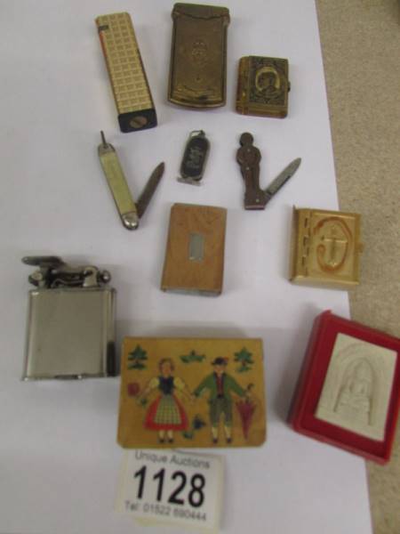 A mixed lot of lighters, match holders, pocket knives etc.,