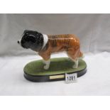 A Beswick St. Bernard on plinth.