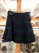 A black watch tartan kilt. Men's 38/40 with new tags.