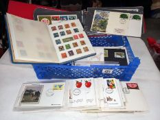 A quantity of First Day covers and album of stamps.