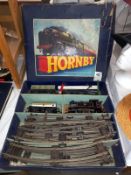 A Hornby 0 gauge tank goods set no 40 clockwork train set.