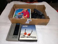 A quantity of 1980's personal stereos including Sony Walkman boxed Lloytron W135 and Ferguson