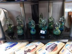 Ten Mdina glass seahorse paperweights, various sizes.
