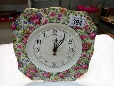 A vintage floral pattern Bentima pottery wall clock.