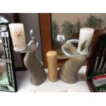 2 mixed media figural candle holders & a bees wax candle